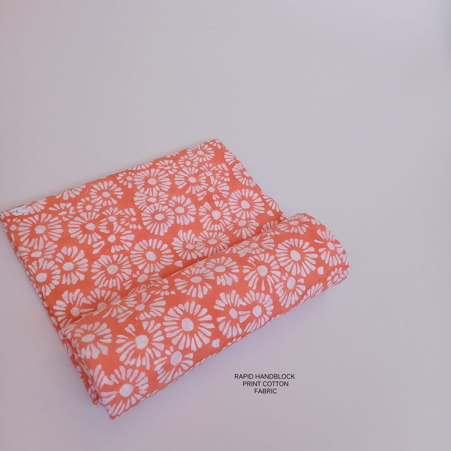 Jaipur Sanganeri handblock printed cotton fabric wholesale in white orange floral print